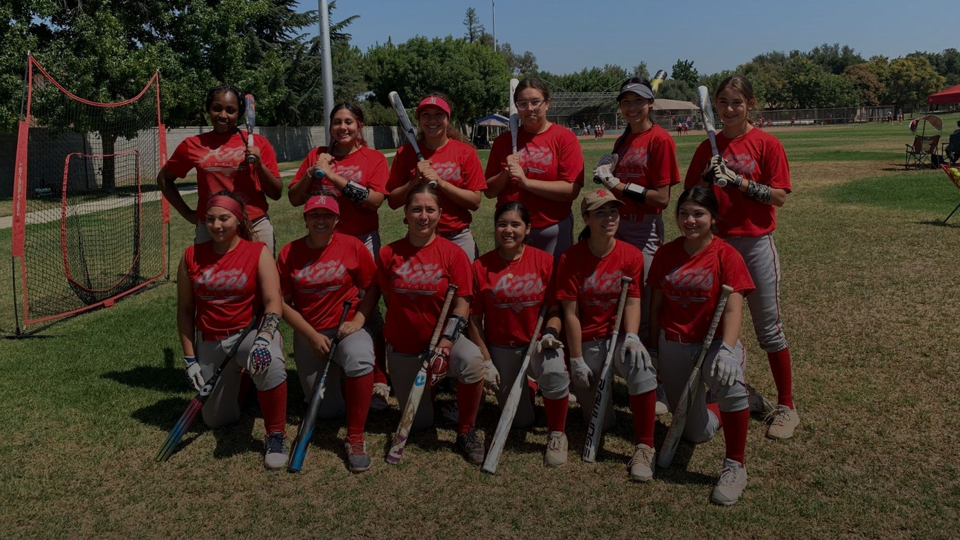 Team of softball players with Bat Hat bat covers